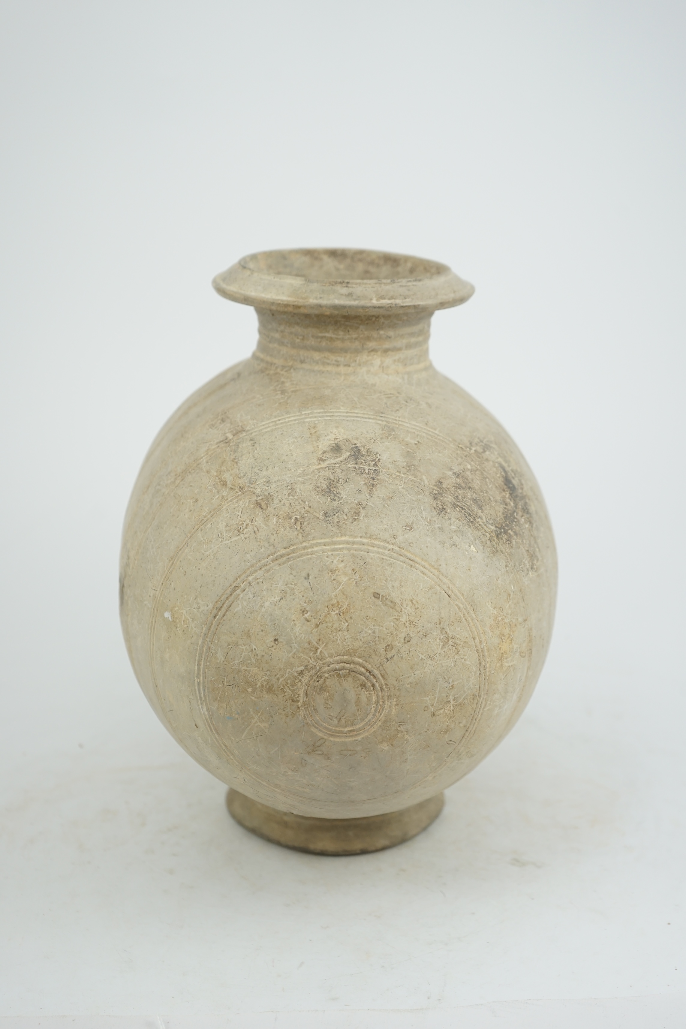 A fine large Chinese burnished pottery cocoon jar, Western Han Dynasty (206 BC-AD 8) or possibly as early as the Qin Dynasty (221-206 BC)